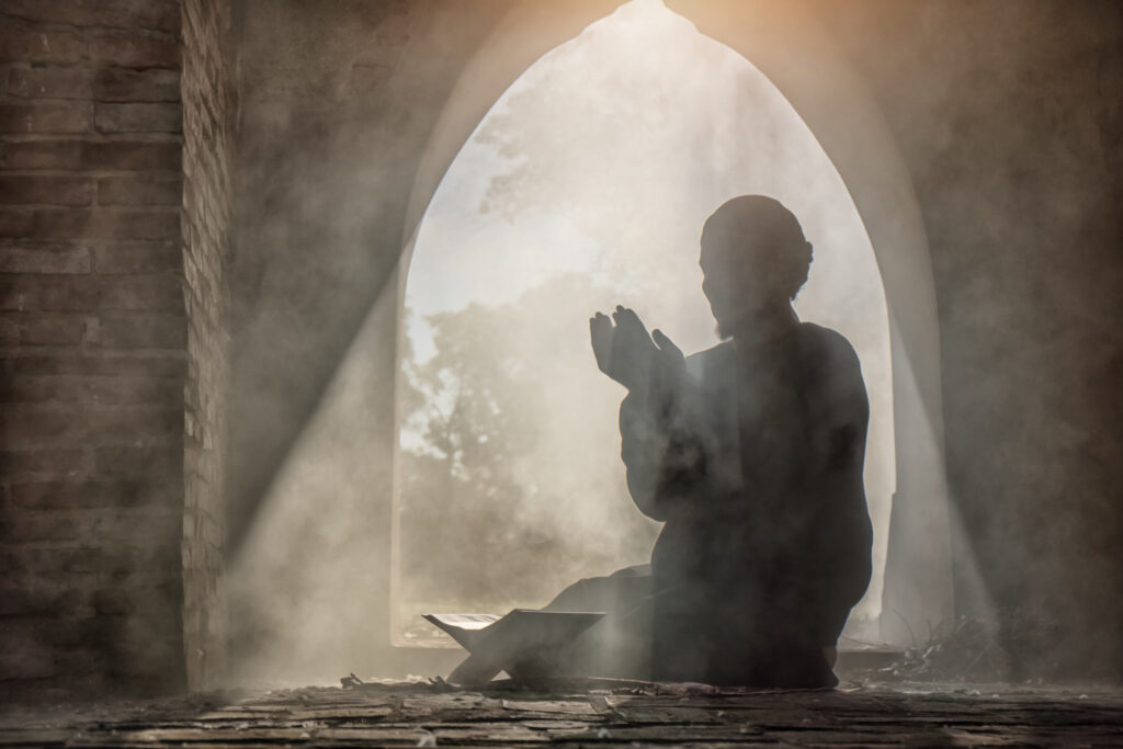 ToF Fotobehang cultuur silhouet van moslim man biddend