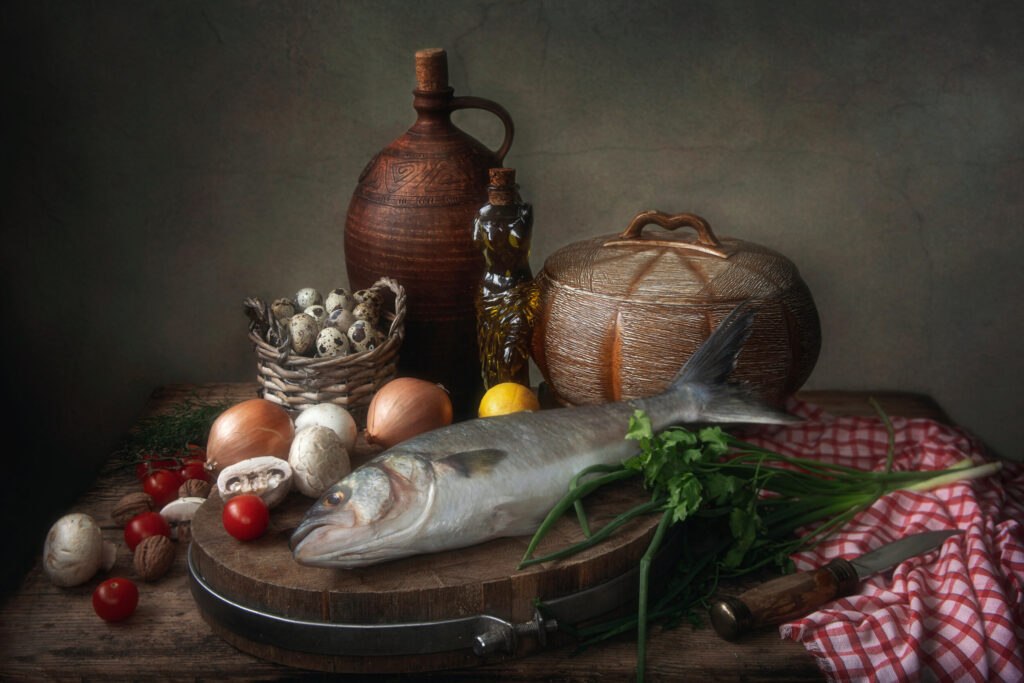 ToF Behang schilderij stilleven met vis en groenten op een keukentafel