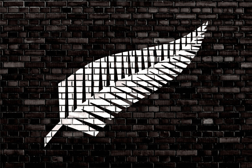 ToF Behang sport vlag van Nieuw-Zeeland op zwarte muur